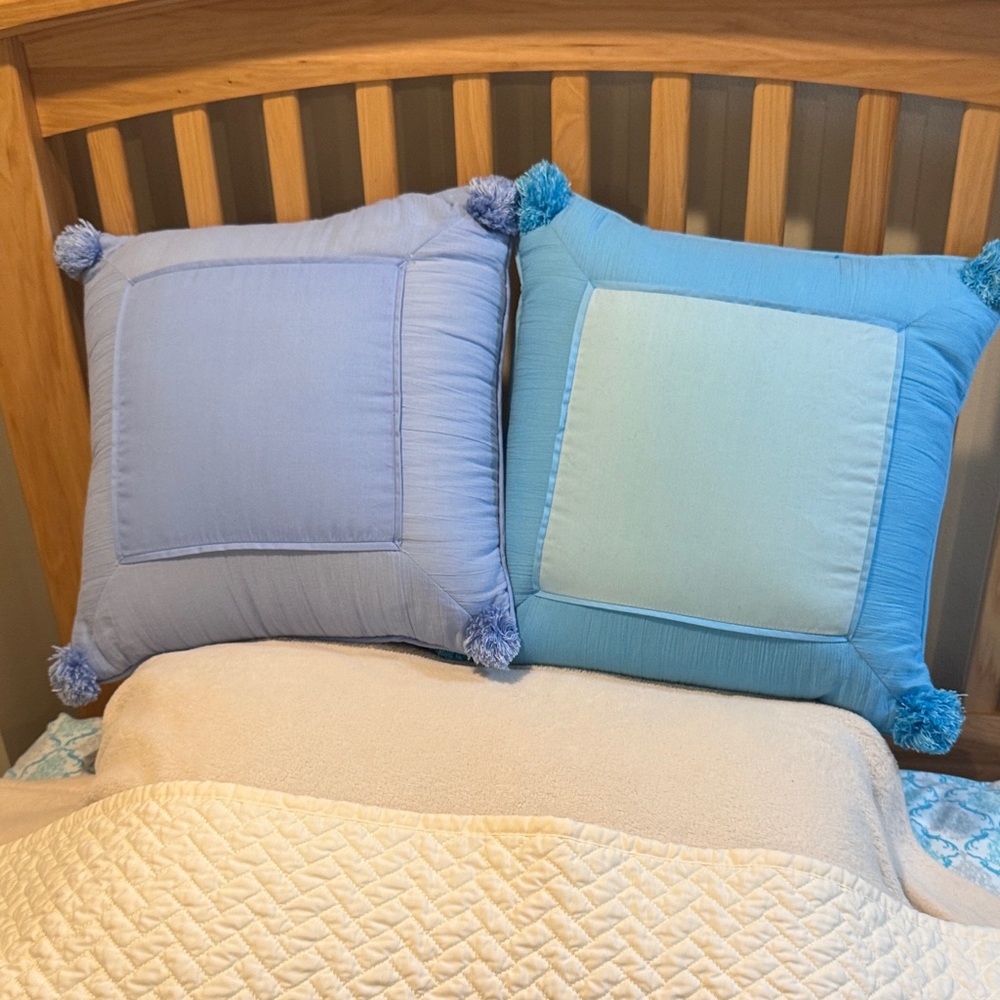 Pottery Barn Kids Blue and Light Blue Pom-Pom Pillows